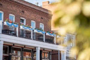 Beautiful balcony with German decorations and a brick building