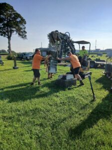 Placing headstone in cemetery
